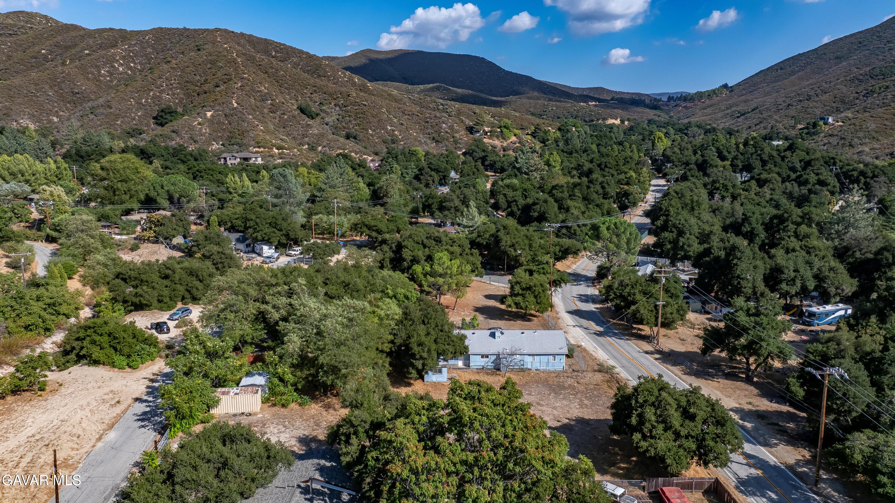 Spunky Canyon Rd Green Valley Green Valley, CA 91390 - Photo 8 of 46 an aerial view of a house with a yard and outdoor seating