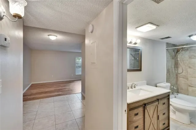 a bathroom with a shower and toilet