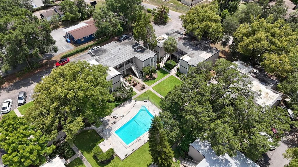 125 Picardy Villa Circle, Unit 100 Brandon, FL 33510 - Photo 38 of 52 an aerial view of a house with a yard and swimming pool