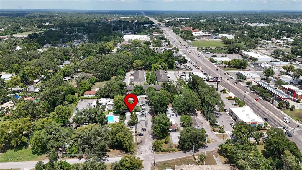 125 Picardy Villa Circle, Unit 100 Brandon, FL 33510 - Photo 48 of 52 an aerial view of residential houses with city and green space
