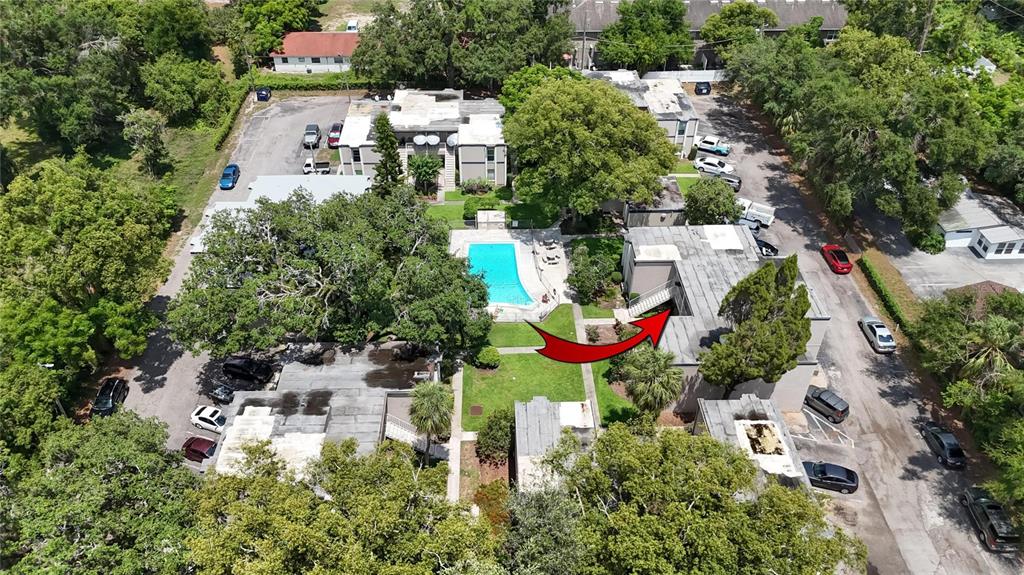 125 Picardy Villa Circle, Unit 100 Brandon, FL 33510 - Photo 51 of 52 an aerial view of a house with a yard and lake view