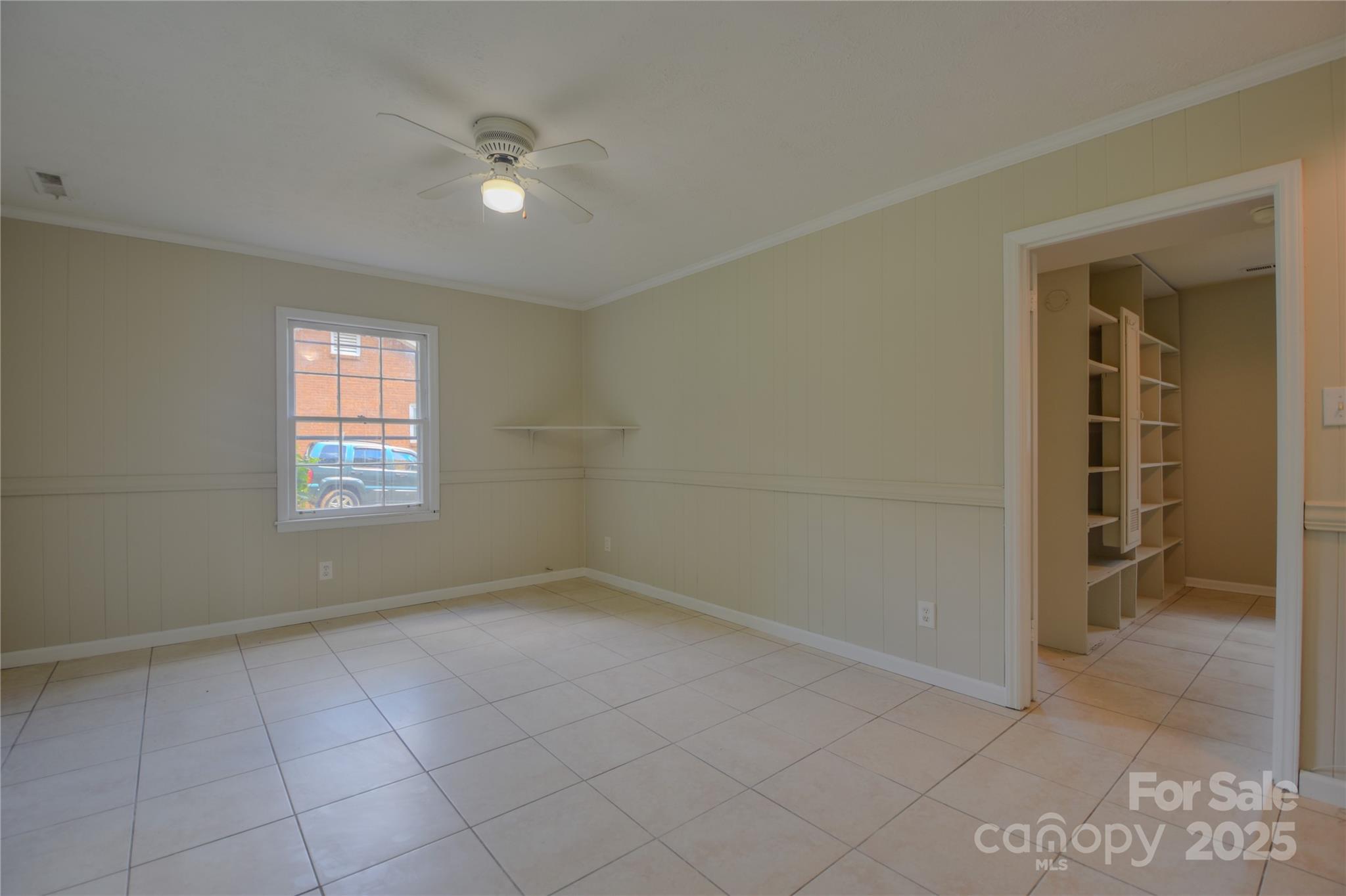 6921 Idlewild Road Charlotte, NC 28212 - Photo 21 of 29 a view of an empty room with a window