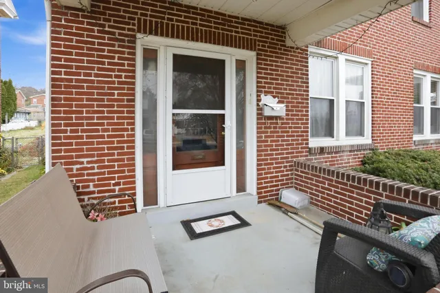 a view of a house with a large window