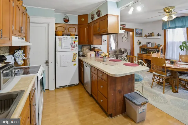 a kitchen with sink cabinets and window