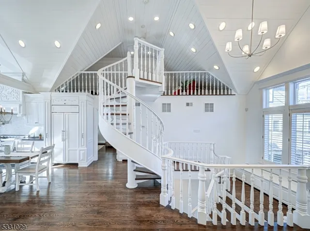 a view of entryway with livingroom and wooden floor