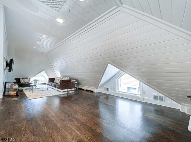 a view of a balcony with furniture