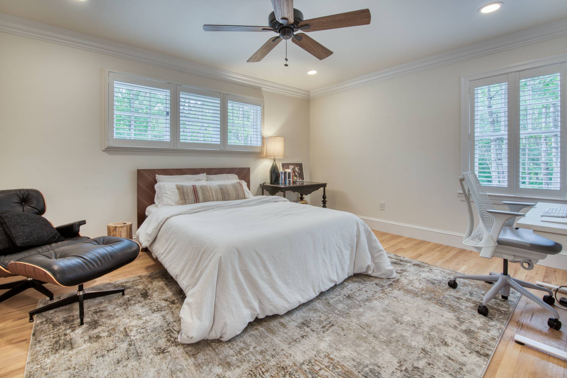 8 Grape Arbor Lane East Hampton, NY 11937 - Photo 12 of 15 a bedroom with a bed and a chair