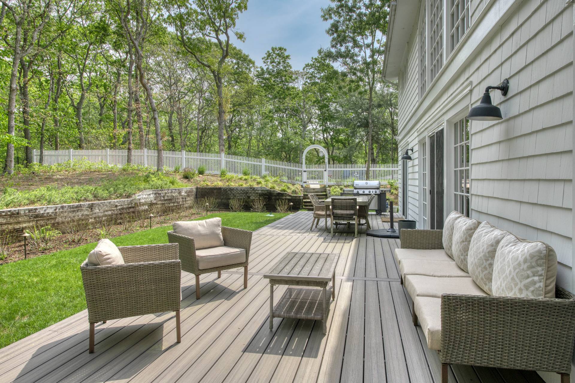8 Grape Arbor Lane East Hampton, NY 11937 - Photo 14 of 15 a view of a chair and tables in the patio