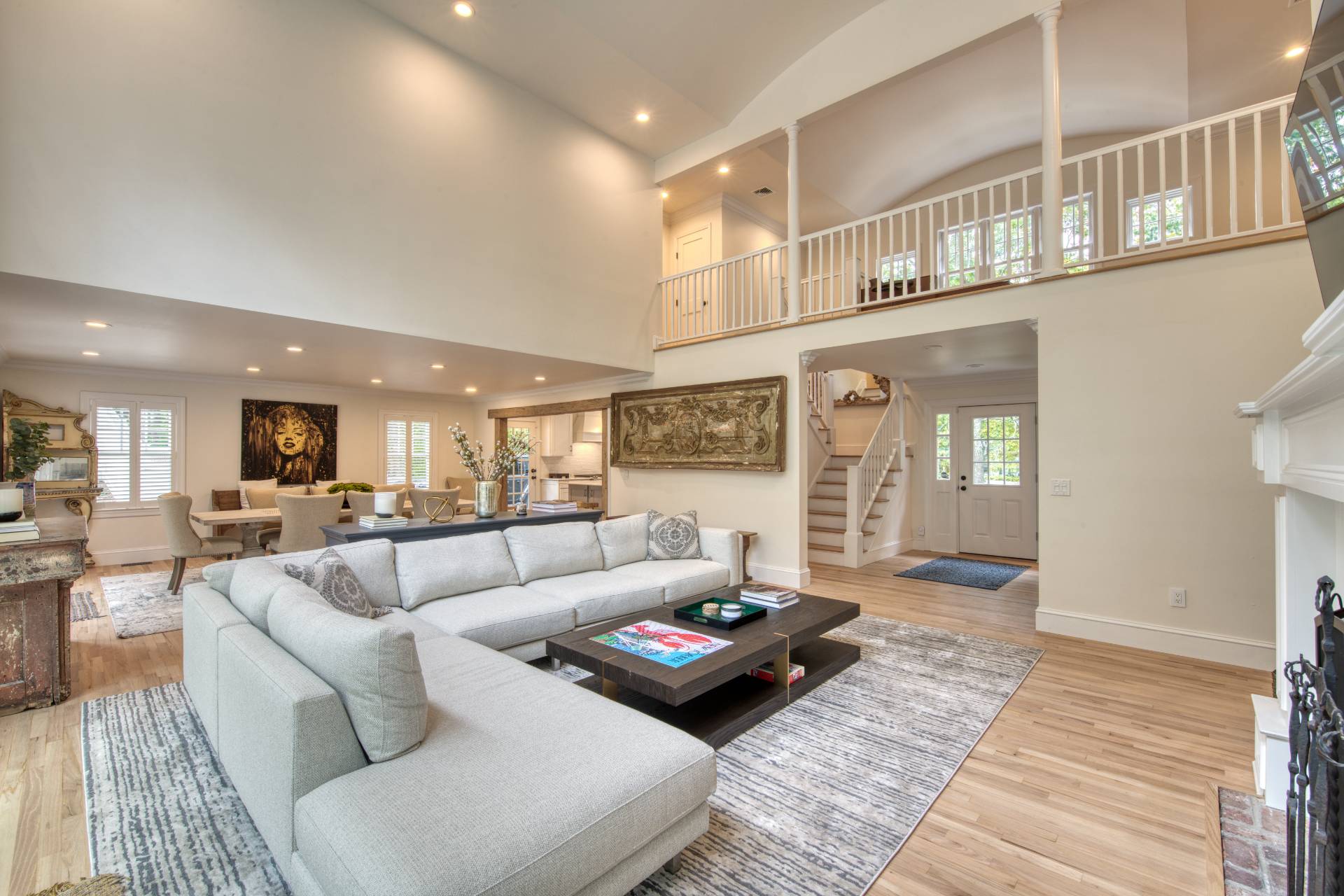 8 Grape Arbor Lane East Hampton, NY 11937 - Photo 3 of 15 a living room with furniture and a table