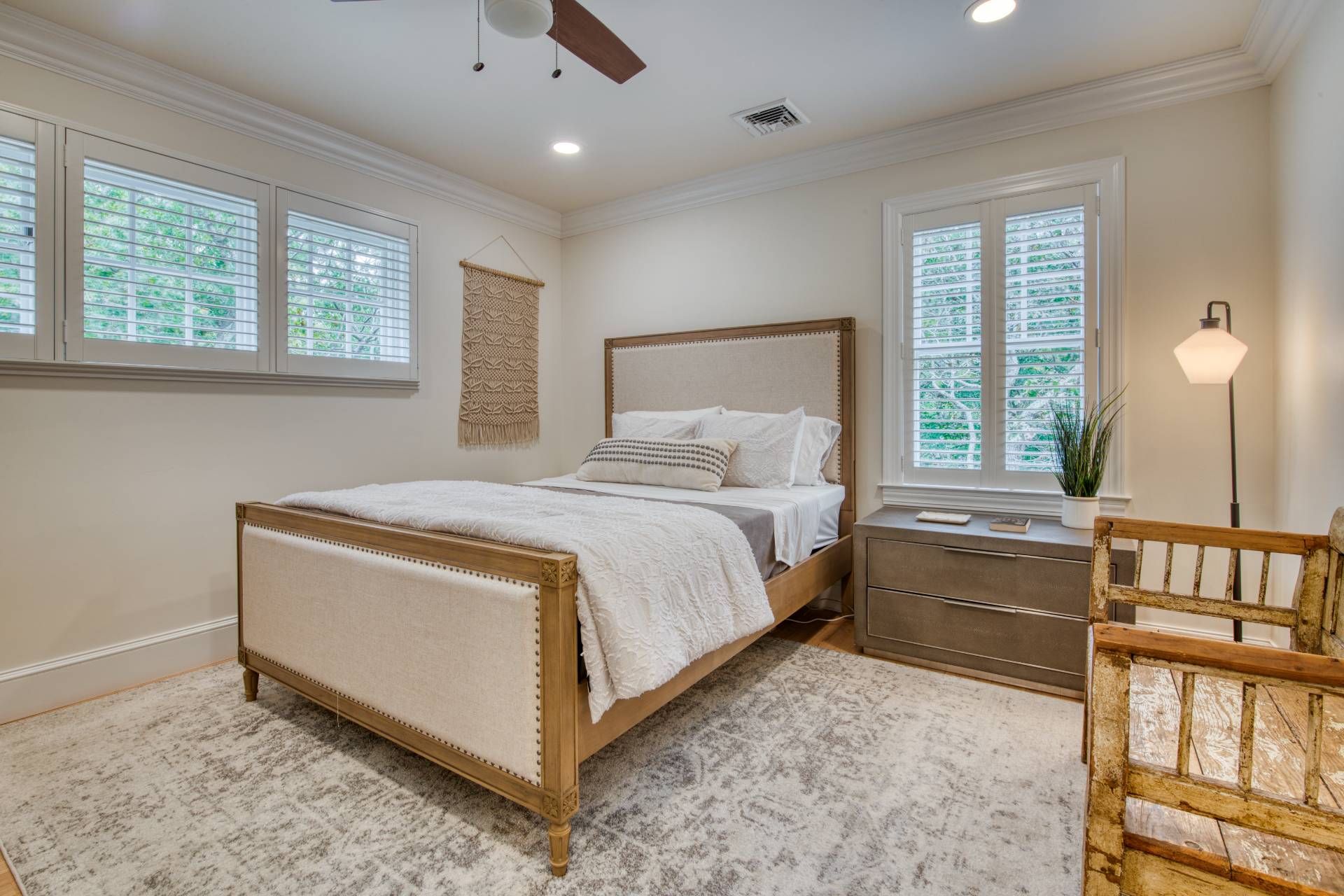 8 Grape Arbor Lane East Hampton, NY 11937 - Photo 9 of 15 a spacious bedroom with a bed and a large window