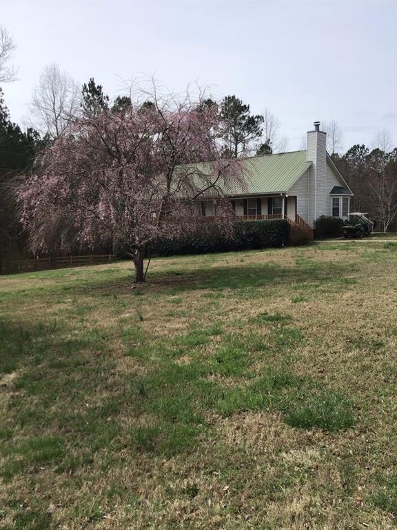 a house view with a garden space