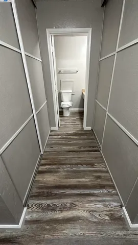 a view of a hallway view with staircase