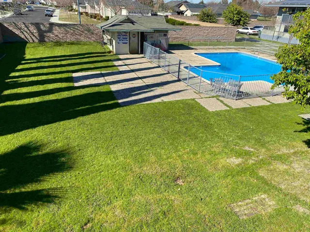 a view of a house with a swimming pool