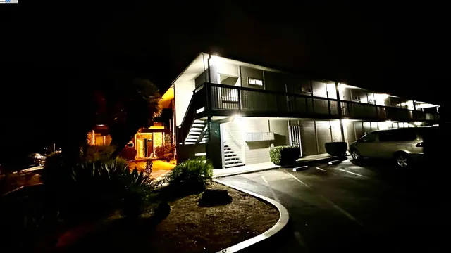 a building outdoor space with lots of trees in the background