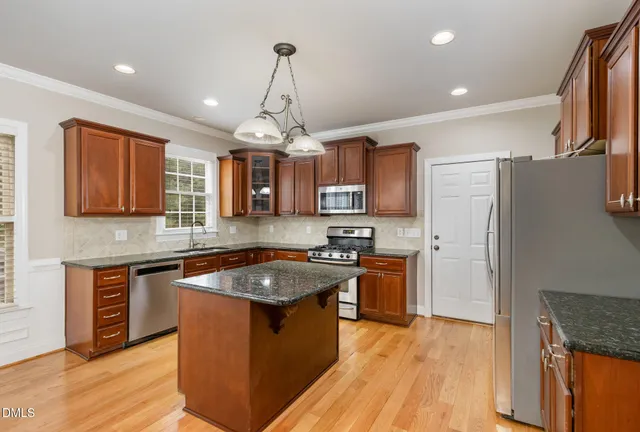 a bedroom with a bed and furniture