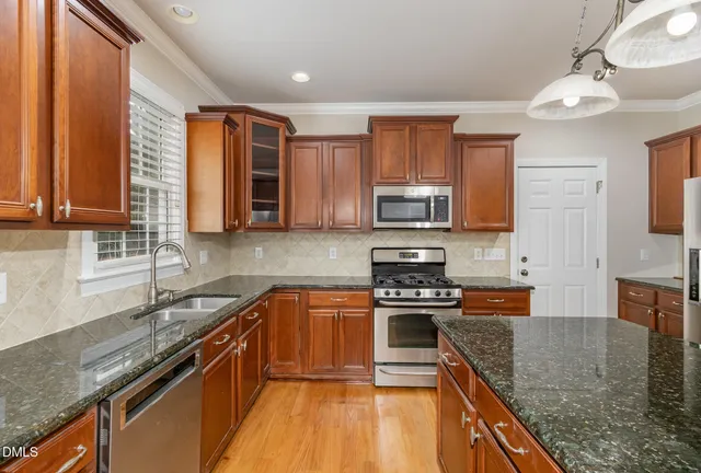 a bathroom with a bathtub and a sink