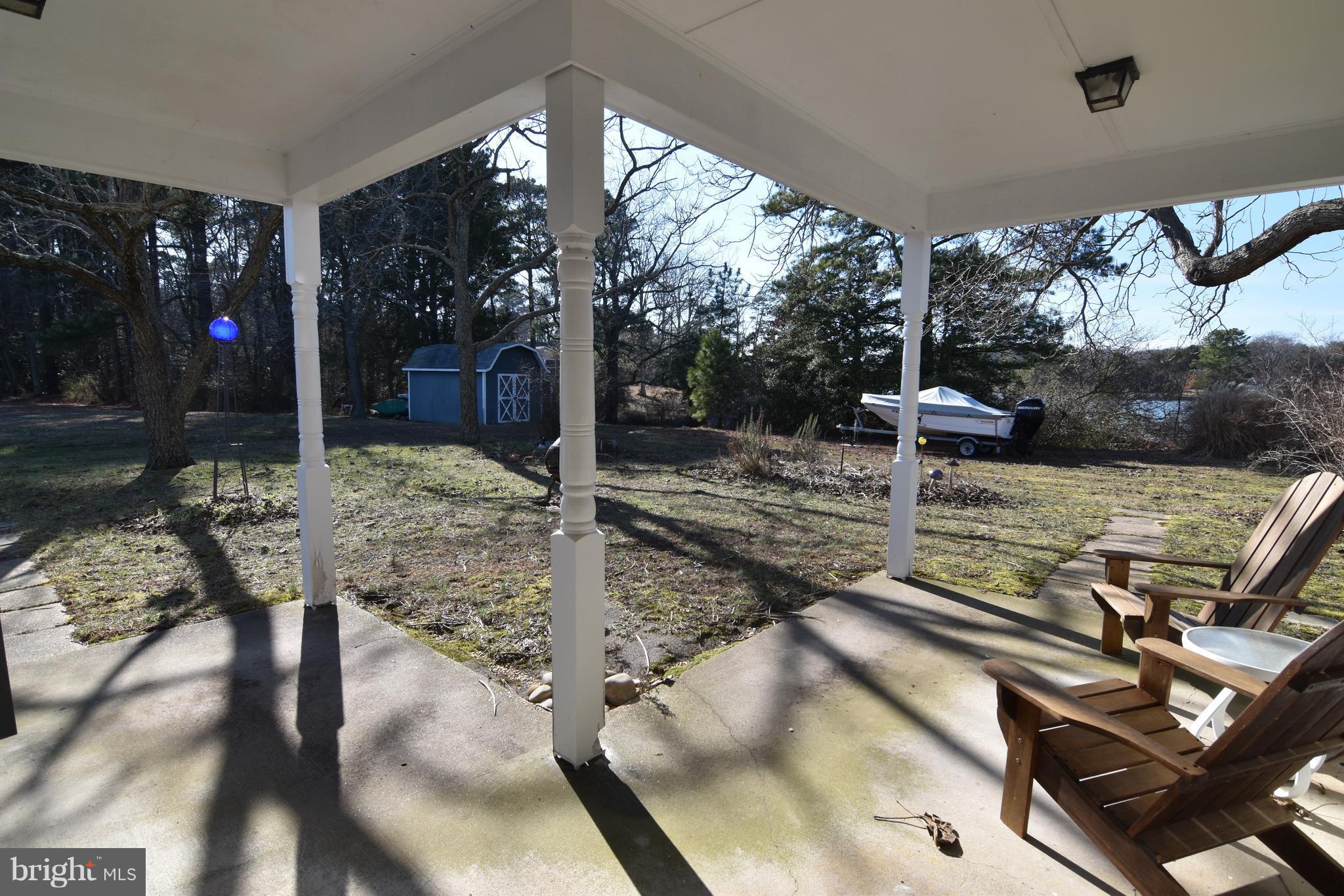 16218 Drury Road Ridge, MD 20680 - Photo 22 of 29 a view of a backyard with sitting area