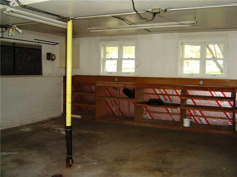 532 Partridge Run Road Gibsonia, PA 15044 - Photo 18 of 19 Parking Lot/Garage. 2 car rear entry large garage with storage shelving