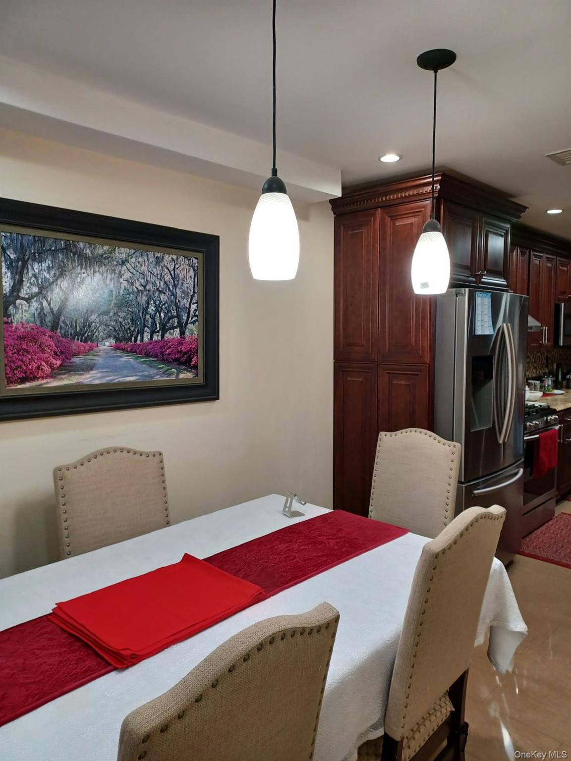 127-22 Kew Gardens Road Queens, NY 11415 - Photo 18 of 21 a bedroom with a bed and a mirror on the dresser