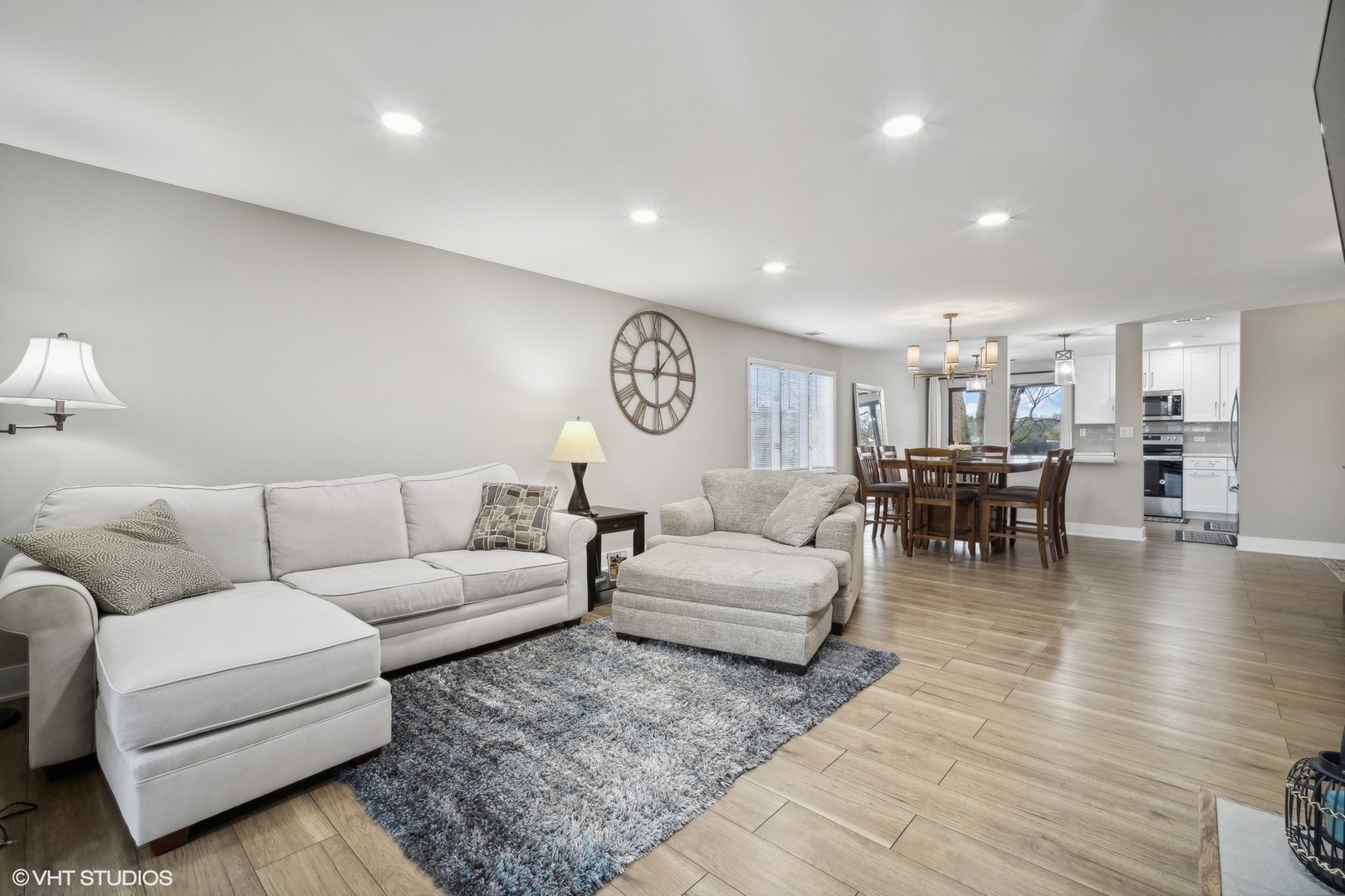 1088 Shermer Road, Unit 204 Northbrook, IL 60062 - Photo 15 of 28 a living room with furniture and wooden floor