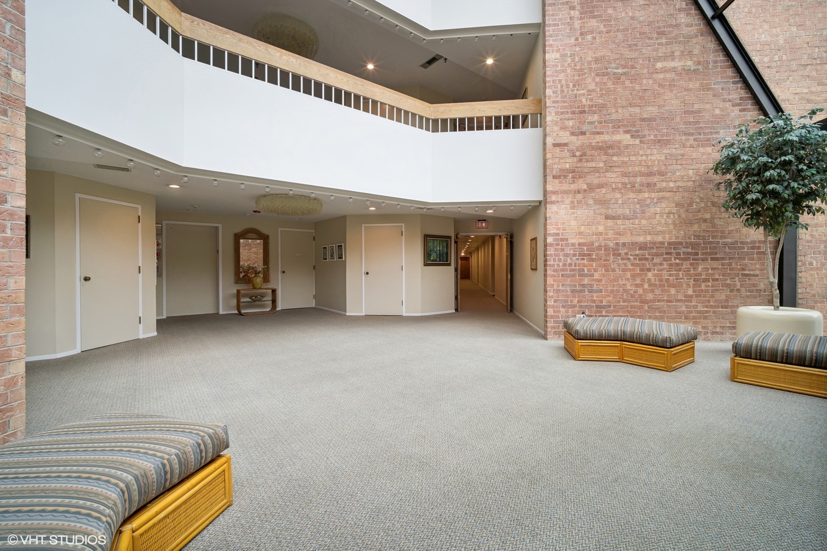 1088 Shermer Road, Unit 204 Northbrook, IL 60062 - Photo 2 of 28 a bed room with a bed and a couch