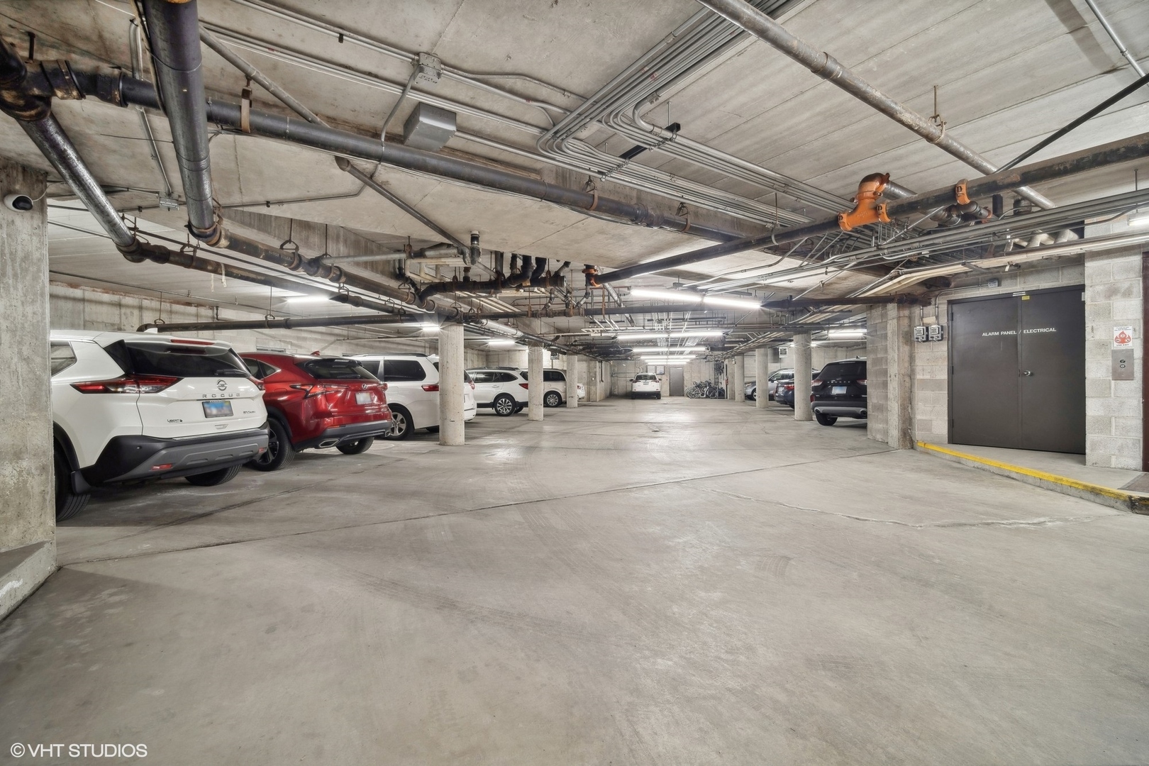 1088 Shermer Road, Unit 204 Northbrook, IL 60062 - Photo 27 of 28 a view of parking garage with cars