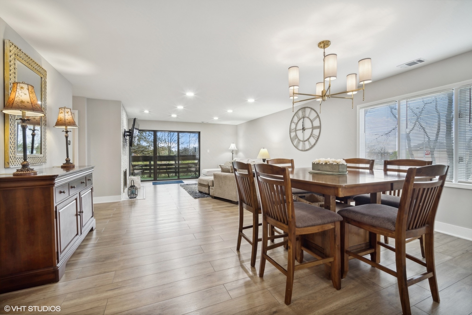 1088 Shermer Road, Unit 204 Northbrook, IL 60062 - Photo 4 of 28 a view of a dining room with furniture and wooden floor
