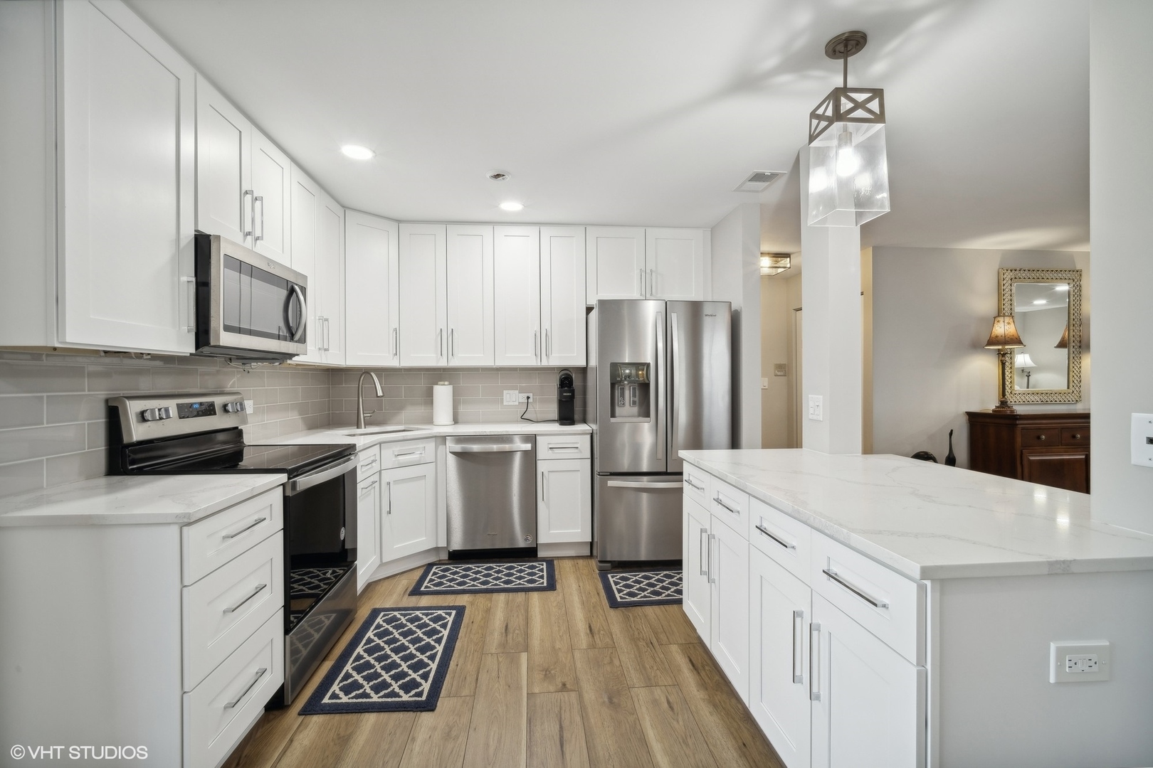 1088 Shermer Road, Unit 204 Northbrook, IL 60062 - Photo 9 of 28 a kitchen with a sink stove and refrigerator