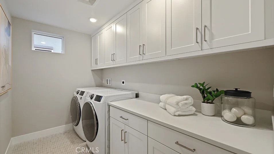 1711 Lychee Street Fullerton, CA 92833 - Photo 26 of 29 a view of cabinets with potted plant on the counter