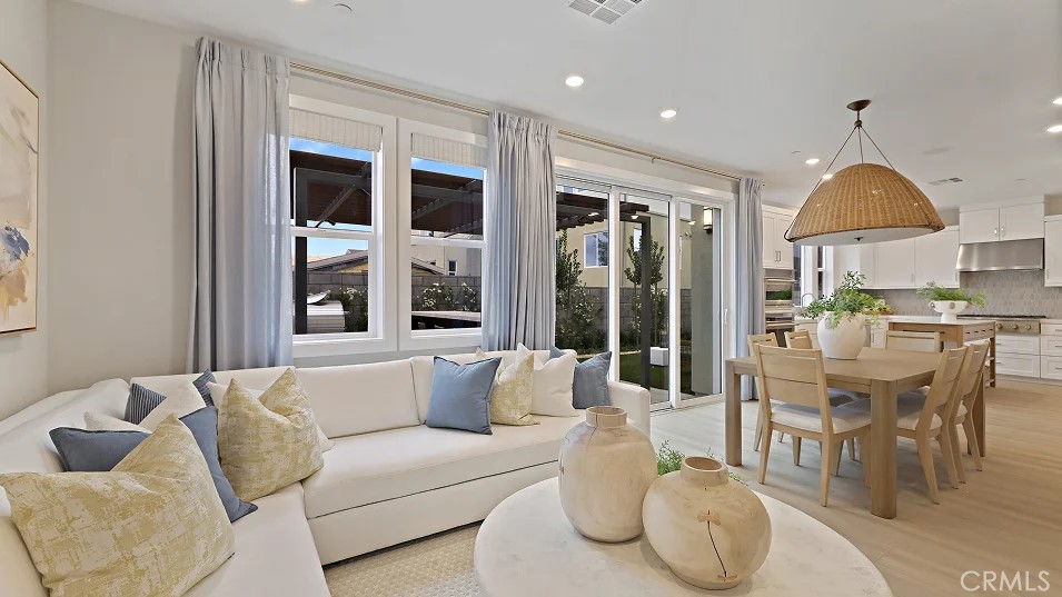 1711 Lychee Street Fullerton, CA 92833 - Photo 6 of 29 a living room with furniture and a large window