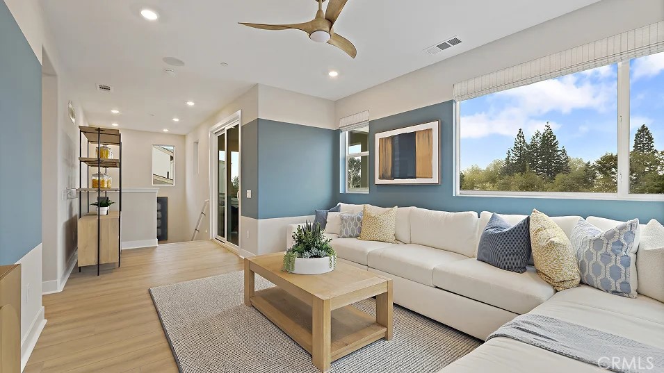 1711 Lychee Street Fullerton, CA 92833 - Photo 7 of 29 a living room with furniture and a large window