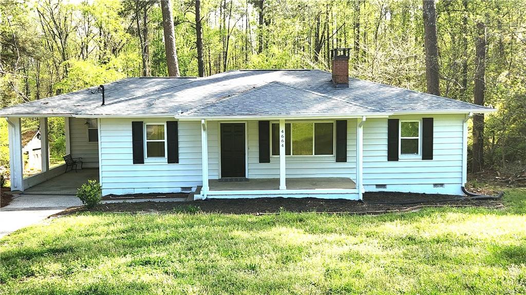 a house view with a garden space