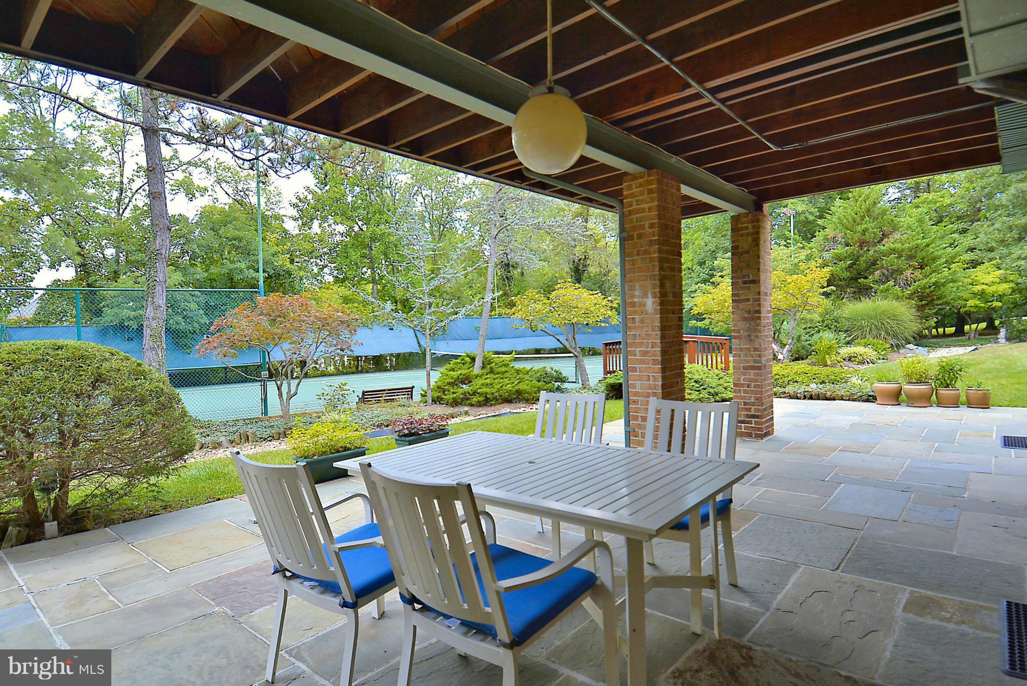 10020 Ormond Road Potomac, MD 20854 - Photo 26 of 30 Covered Patio Area has Outdoor Fireplace