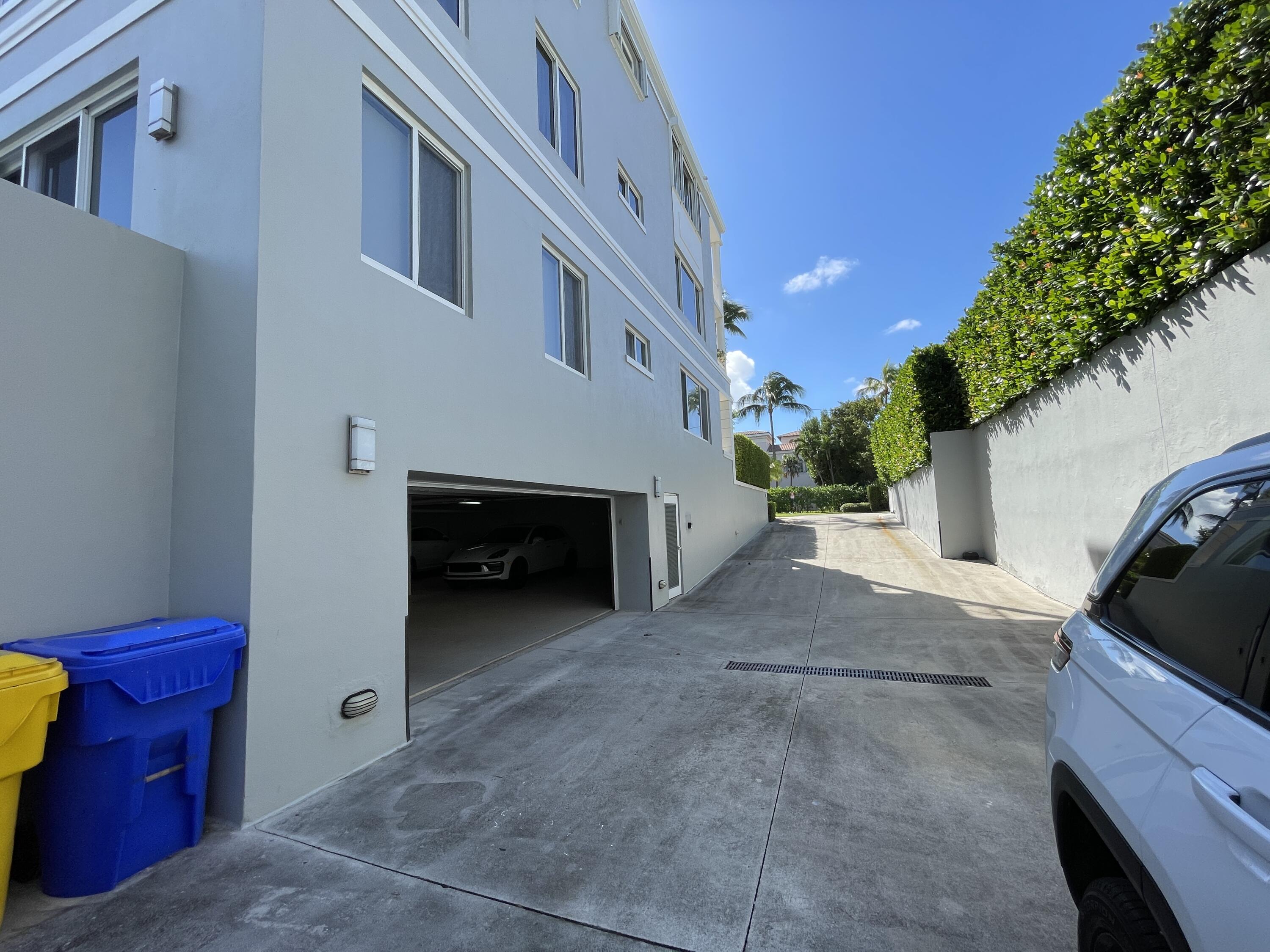 145 Peruvian Avenue, Unit 301 Palm Beach, FL 33480 - Photo 14 of 16 a view of a house with a garage