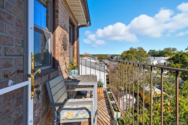 a view of balcony with furniture
