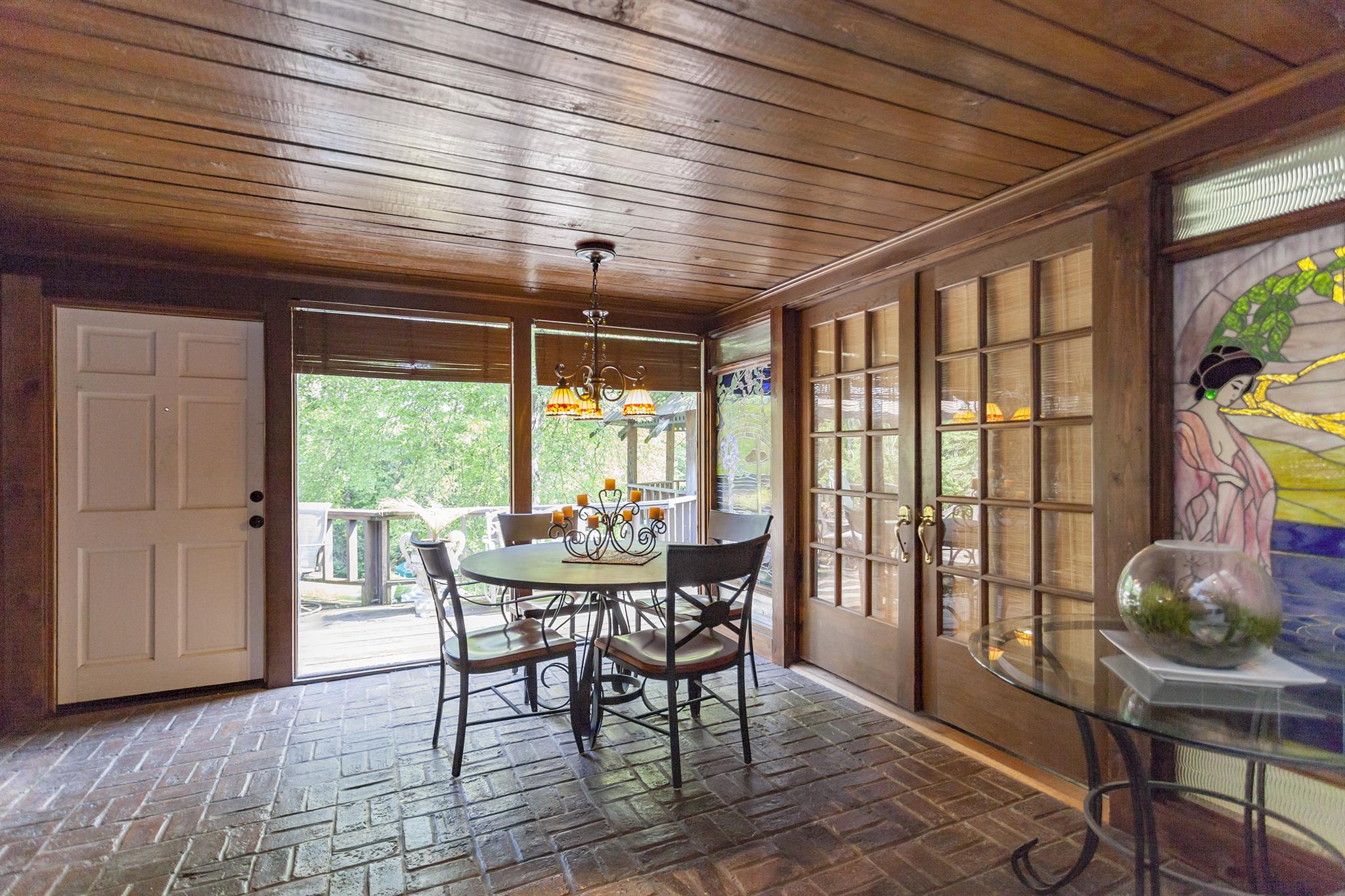 1635 Camp Ravine Road Burns, TN 37029 - Photo 16 of 28 a dining room with furniture and window