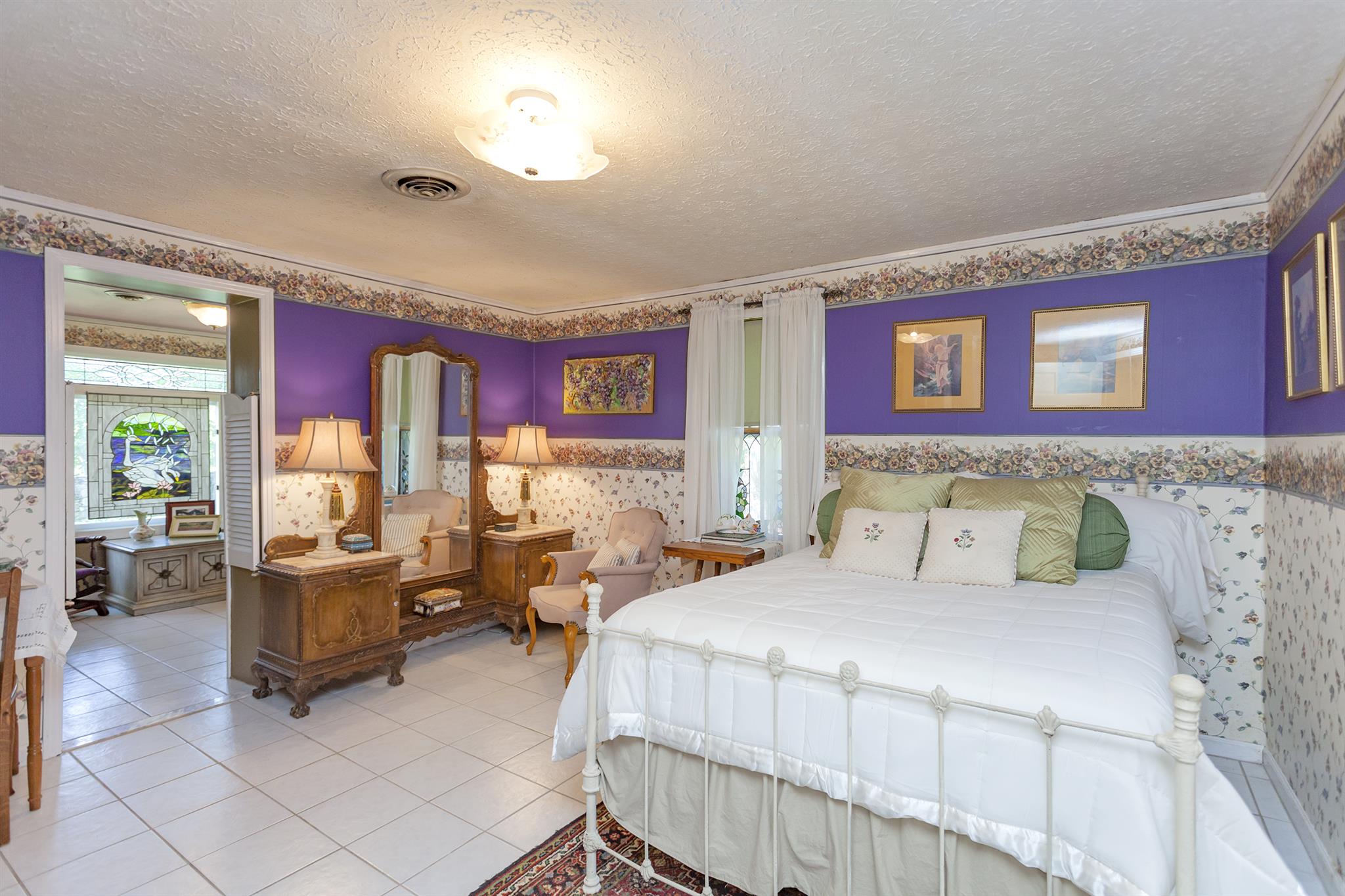 1635 Camp Ravine Road Burns, TN 37029 - Photo 21 of 28 a bedroom with a bed and wooden floor