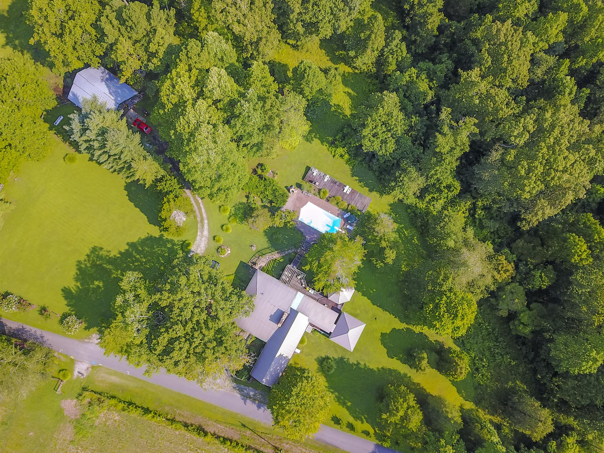 1635 Camp Ravine Road Burns, TN 37029 - Photo 4 of 28 an aerial view of a house