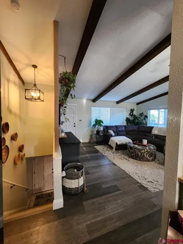 a bathroom with a sink mirror vanity and toilet
