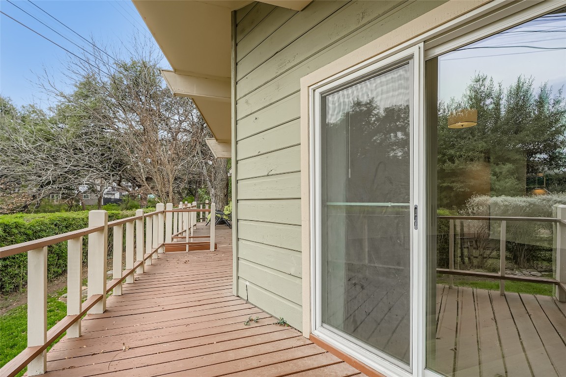 2000 Cody Court, Unit A Austin, TX 78704 - Photo 23 of 36 a view of a balcony with wooden floor