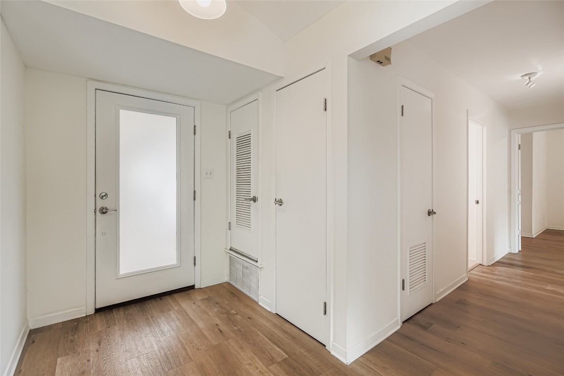 2000 Cody Court, Unit A Austin, TX 78704 - Photo 3 of 36 a view of a hallway with wooden floor