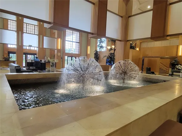 a view of a living room and dining room