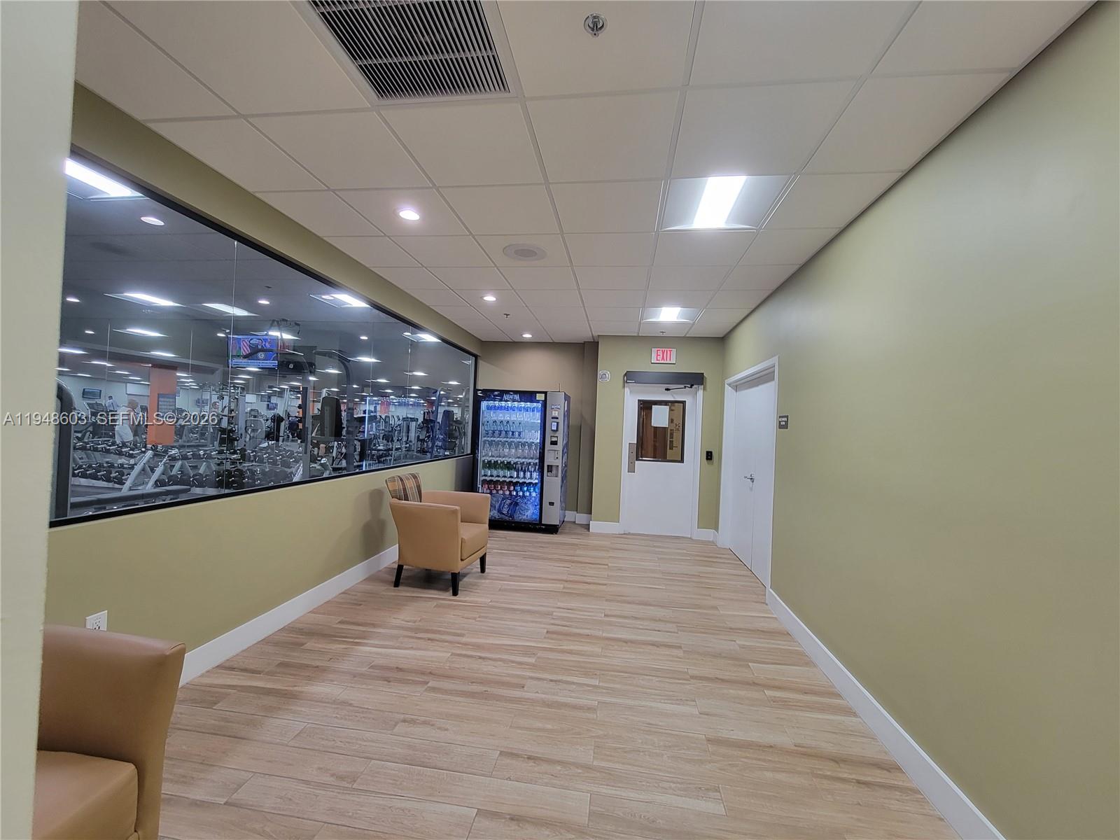 196 Mansfield F, Unit 196 Boca Raton, FL 33434 - Photo 48 of 58 a view of a living room and dining room