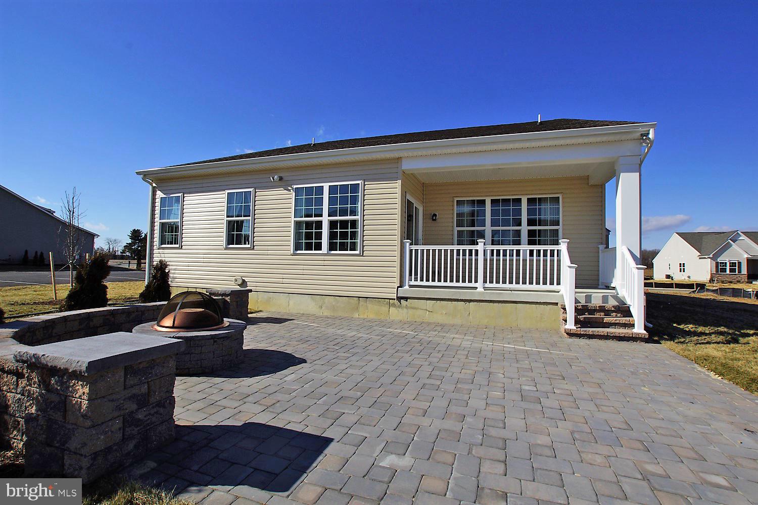 1067 Robinson Road, Unit LAKELAND Townsend, DE 19734 - Photo 31 of 32 Rear patio and fire pit