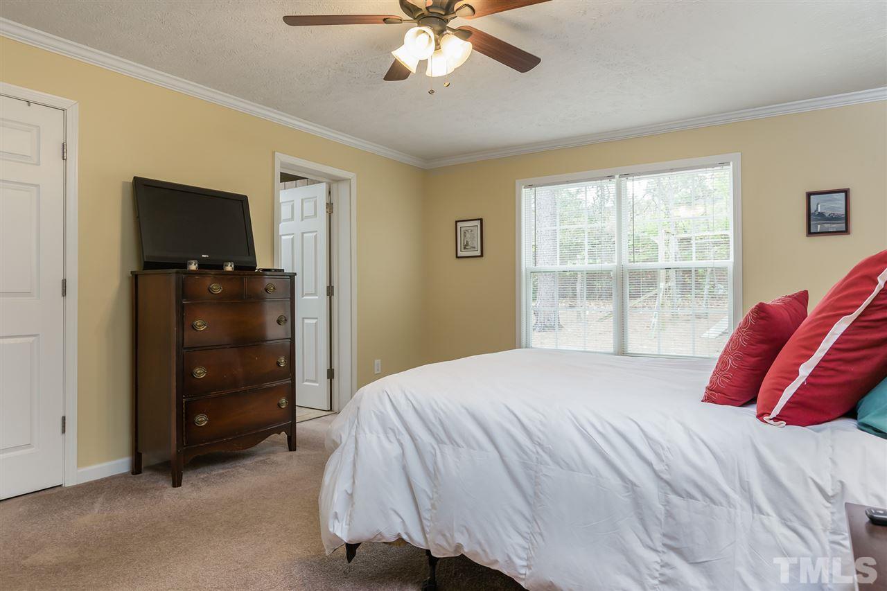 707 Sun Road Aberdeen, NC 28315 - Photo 12 of 23 a bedroom with a bed and a window