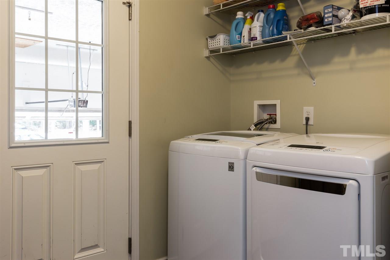 707 Sun Road Aberdeen, NC 28315 - Photo 15 of 23 a utility room with dryer and washer