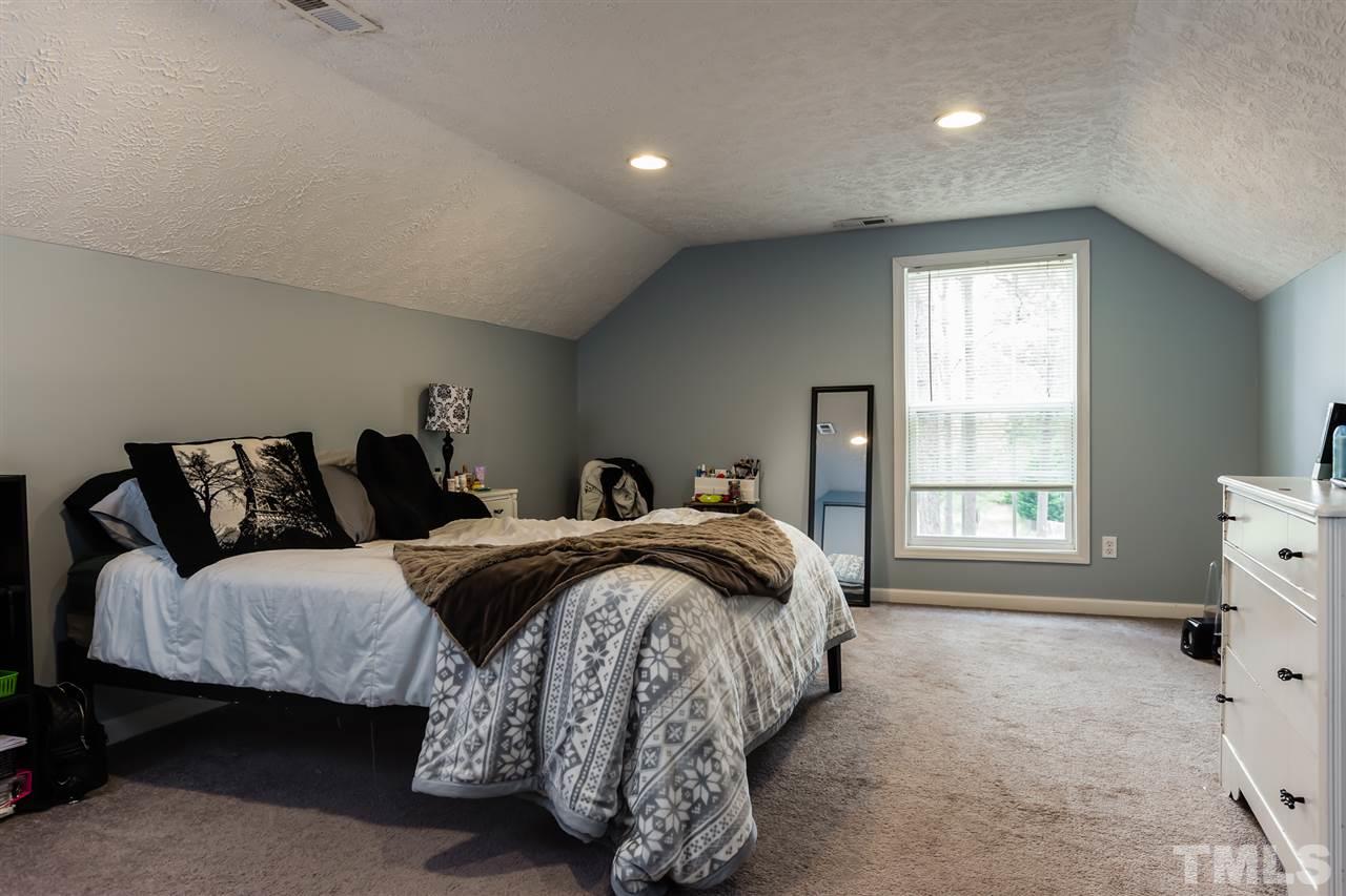 707 Sun Road Aberdeen, NC 28315 - Photo 17 of 23 a bedroom with a bed and a window