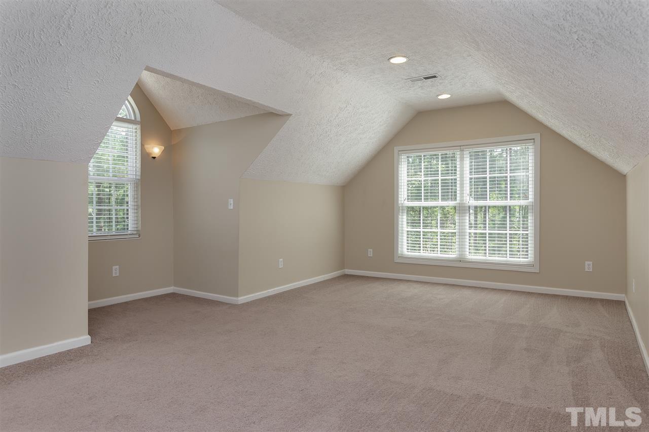 707 Sun Road Aberdeen, NC 28315 - Photo 20 of 23 an empty room with windows and closet