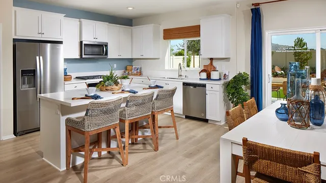 a spacious bedroom with a bed and a large window