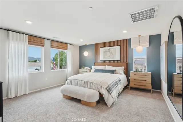 a room with a sink and a mirror